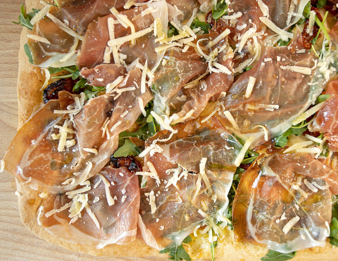 Pizza Prosciutto and Arugula