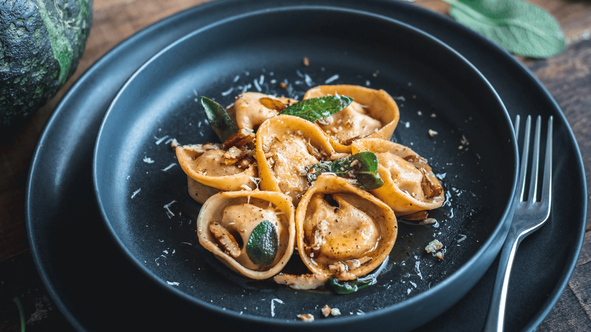 Balsamic-Drizzled Pumpkin Tortelli with Brown Butter and Pecans