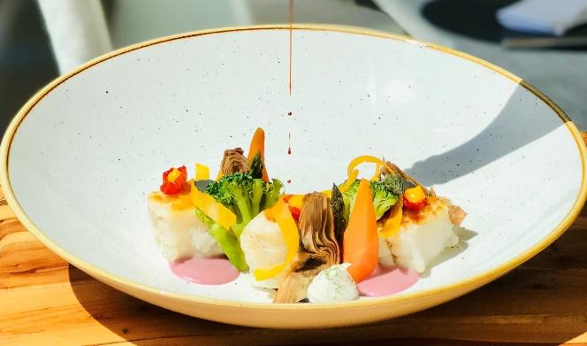 Monkfish, caramelized red onion sauce, pecorino mousse with truffle, seasonal vegetables, mullet bot