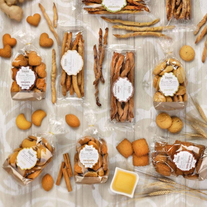 Bag of acacia honey cookies with rustic packaging, displayed with assorted cookies