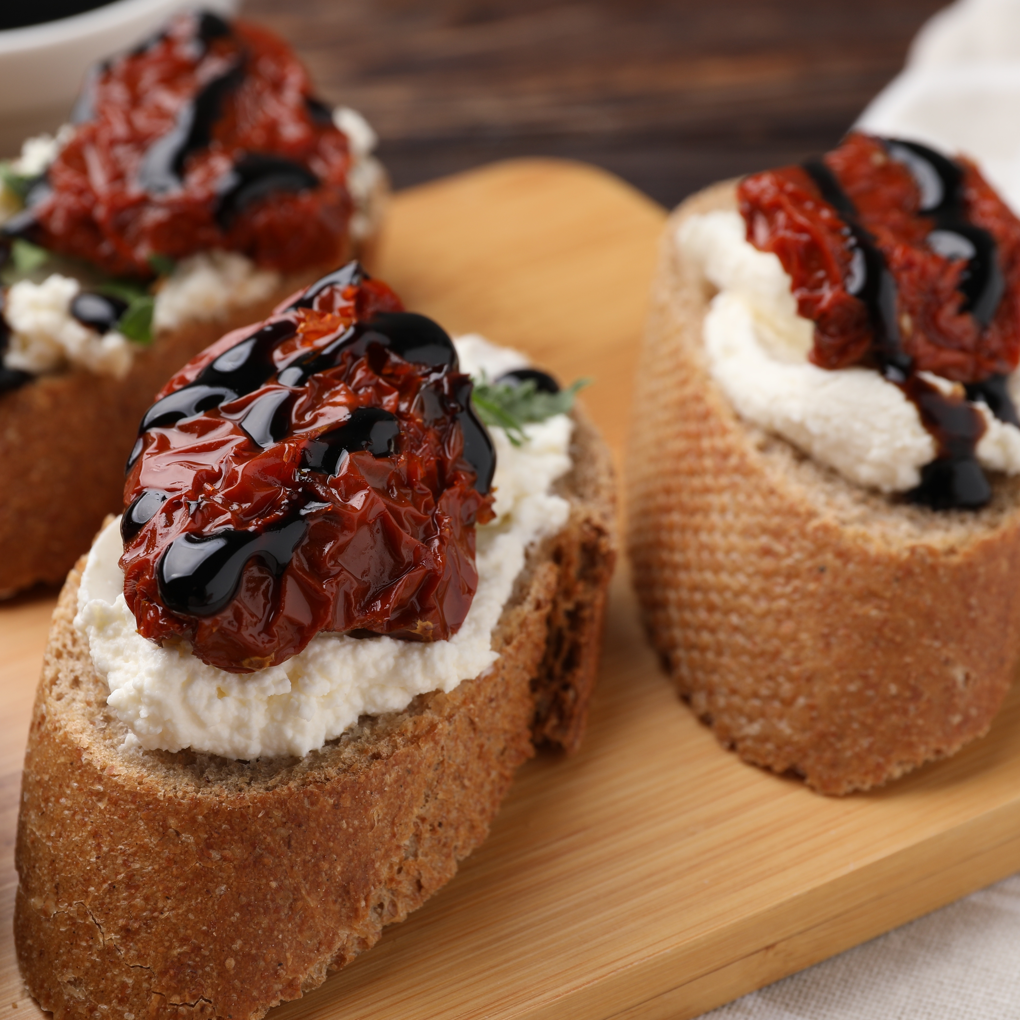 Crispy bruschetta topped with fresh tomatoes and drizzled with Burgundy Label Balsamic Vinegar, Masserie di Santeramo