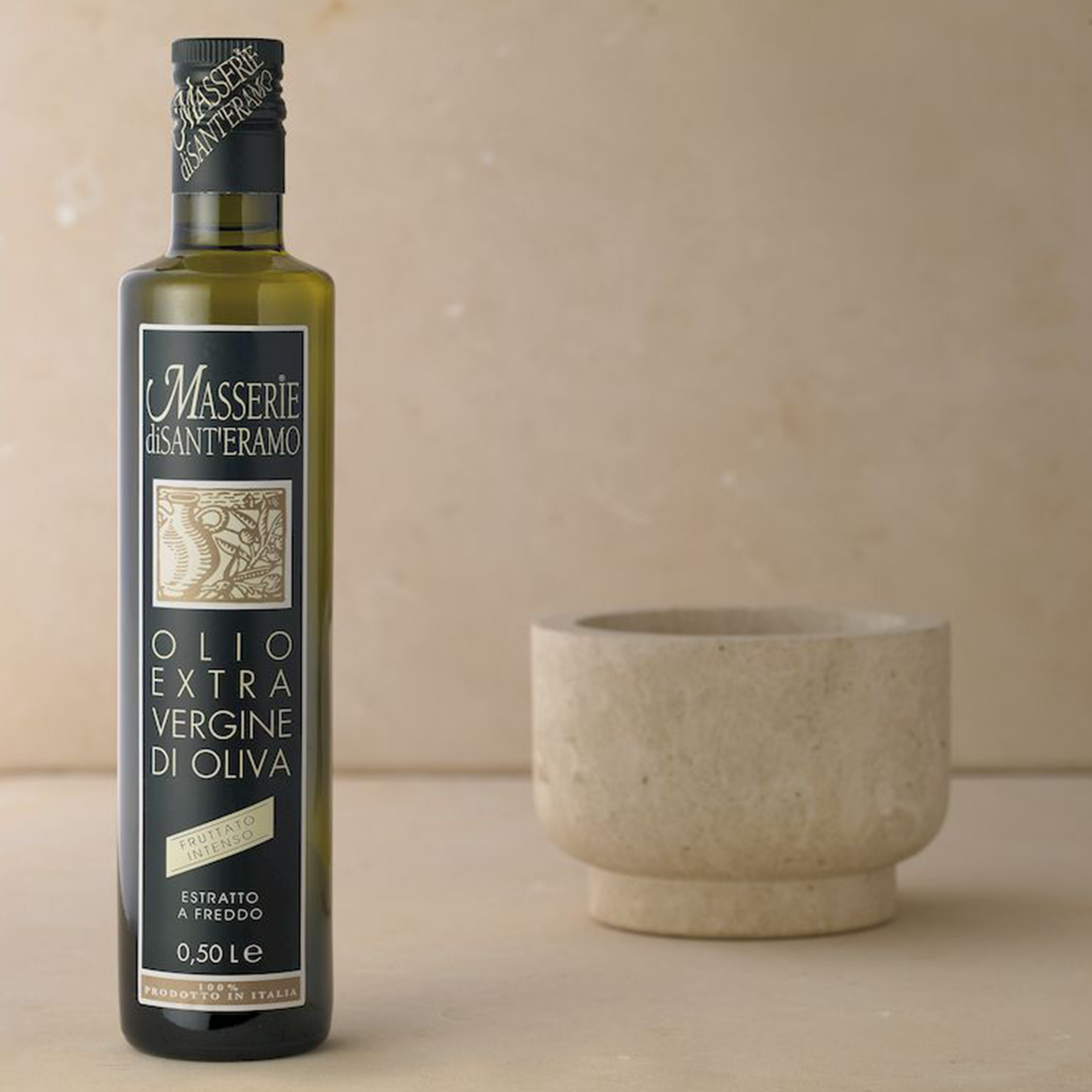 Flavorful Extra Virgin Olive Oil bottle placed on a clean, modern kitchen countertop, Masserie di Santeramo