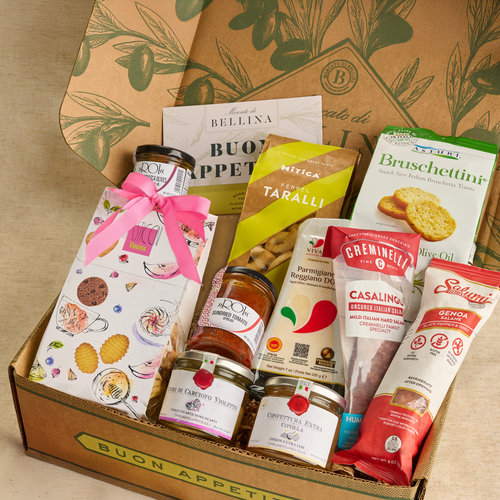 Gourmet food gift box with various Italian snacks and products for meat and cheese board