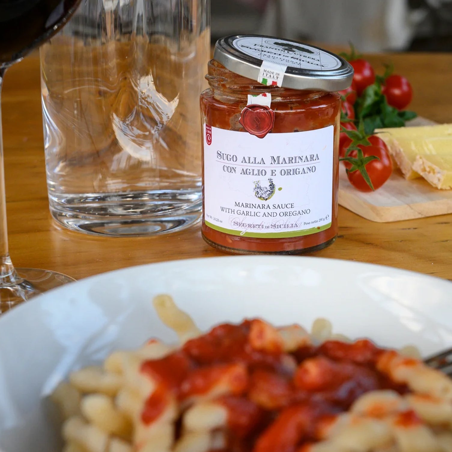 Organic busiate pasta with basil pesto vegan sauce in bowl