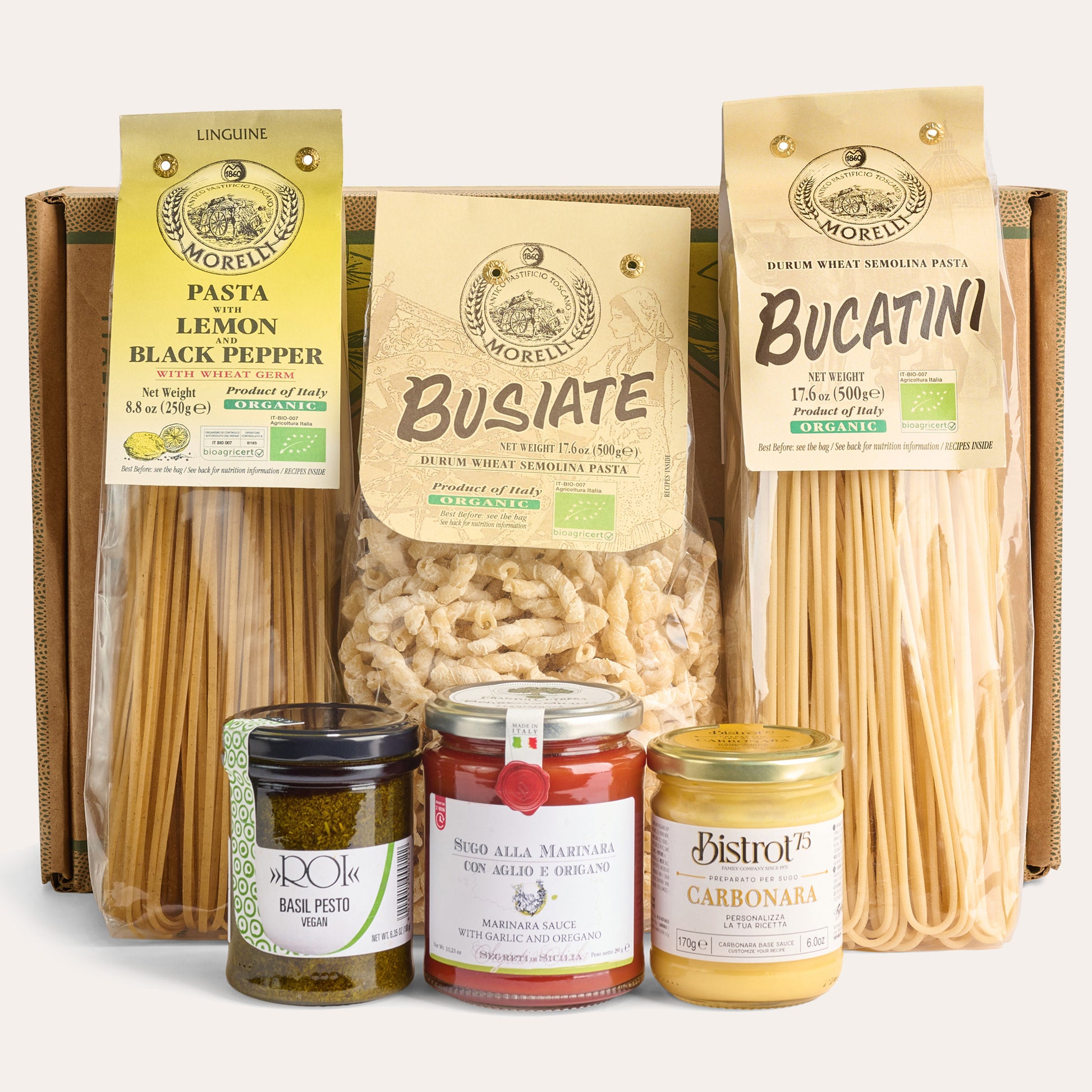 Gift box with bucatini, busiate pasta, carbonara sauce, marinara sauce, basil pesto