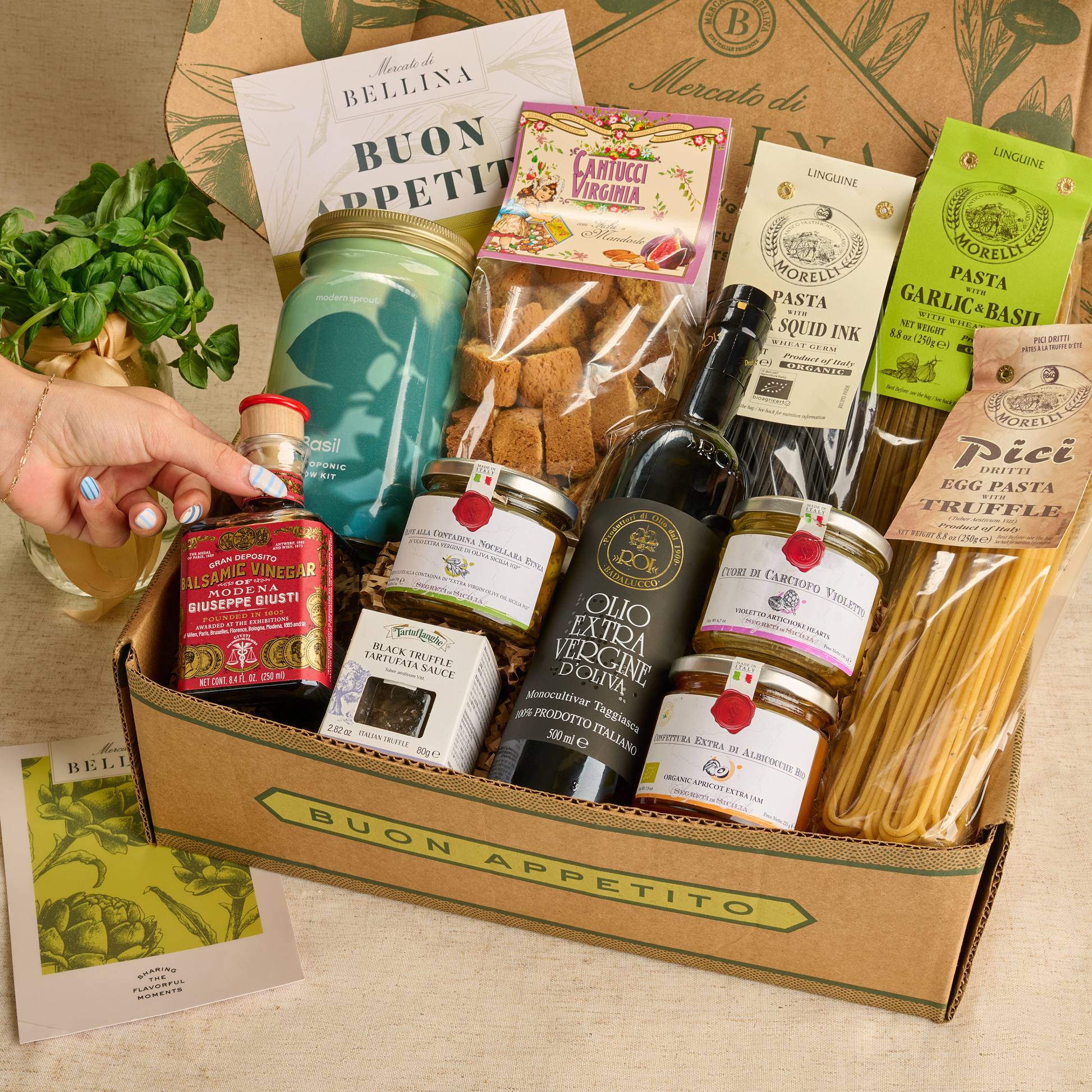 Gift box with pasta, olive oil, biscotti, spreads, balsamic vinegar, and basil kit