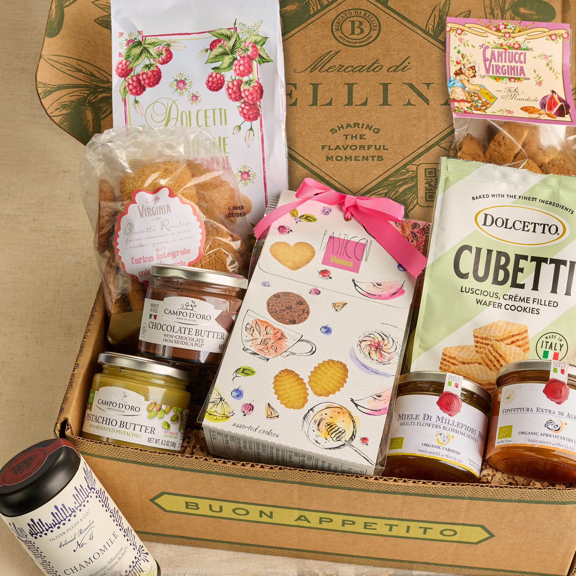 Assorted food items including cookies, chocolates, and jams in a 'Buon Appetito' box.
